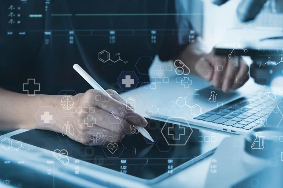 Close-up of a medical professional using a laptop and tablet, with illustrated medical symbols overlayed on the image, symbolizing health conditions treated by Deborah Wilson, M.D. & Associates in Scottsdale.